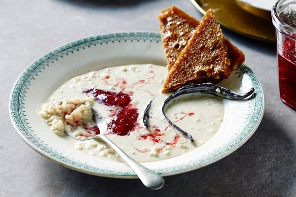 Rice pudding with strawberry jam and pistachio brittle