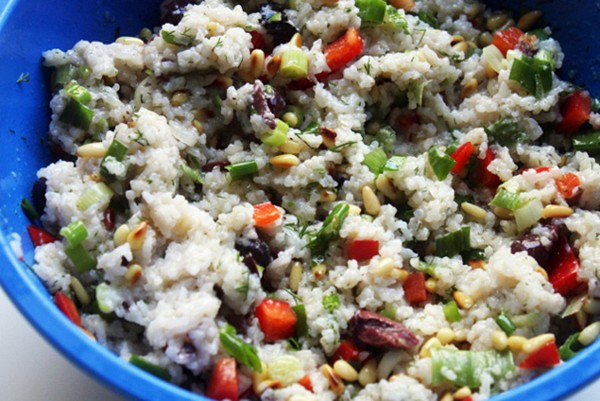 Rice salad with olives and pine nuts