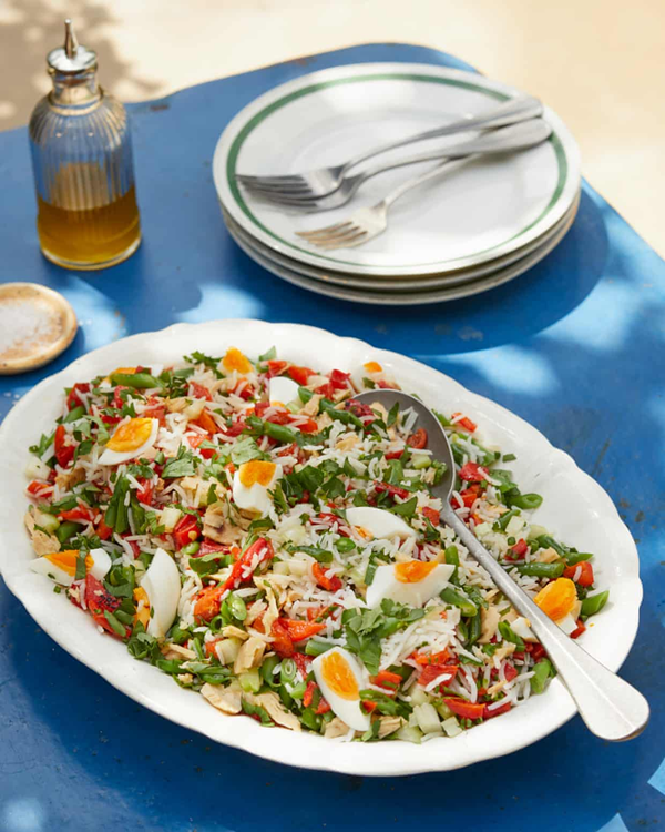 Rice salad with red peppers, celery, herbs and egg