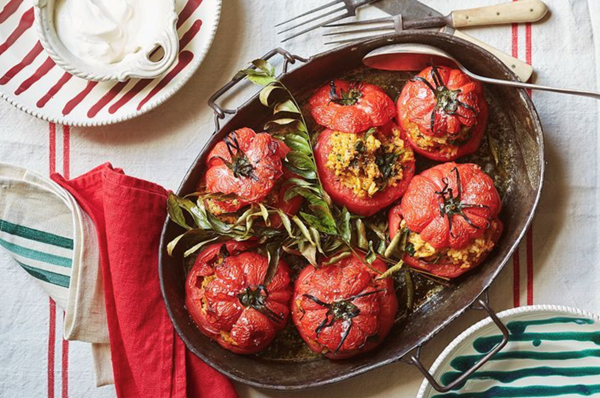 Rice-stuffed tomatoes with mustard seeds and curry leaves