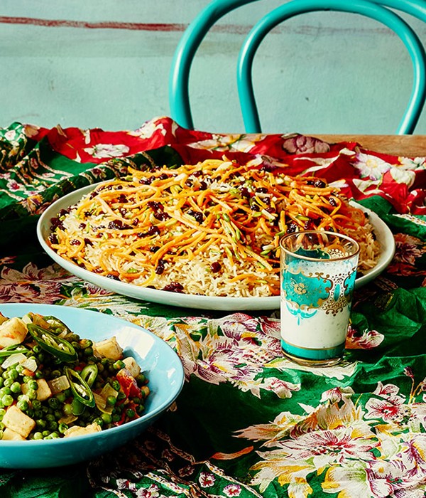 Rice topped with carrot, almonds and pistachios (Kabuli palaw)