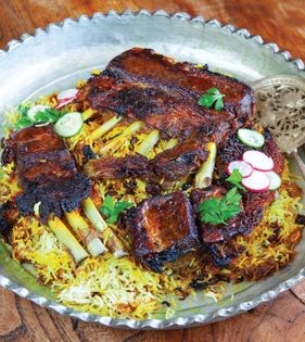 Rice with lamb rib chops tah-dig (Dandeh polow-ye Ilamati)