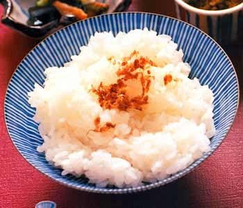Rice with soy-glazed bonito flakes and sesame seeds