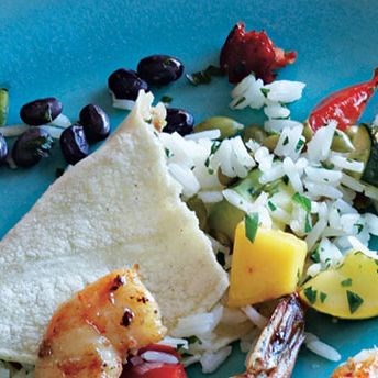 Rice with summer squash, red peppers, and roasted pepitas