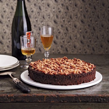 Rich chocolate cake with salty dulce de leche & hazelnut brittle