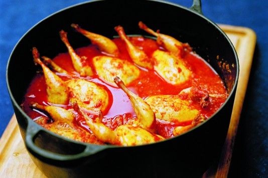 Rich red quail curry