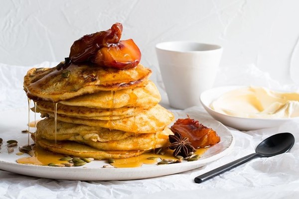 Ricotta & rosemary hotcakes with maple peaches and seeds