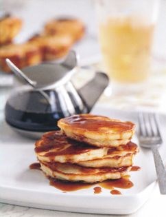 Ricotta and coconut hotcakes with espresso syrup