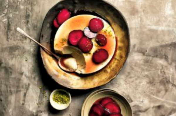 Ricotta and pistachio panna cotta with blood plums