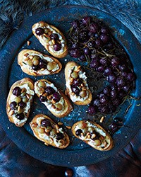 Ricotta and roasted grape crostini