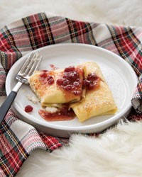 Ricotta blintzes with lingonberry syrup