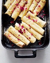 Ricotta crêpes with honey, walnuts and rose