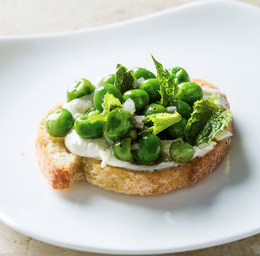 Ricotta crostini with peas and mint