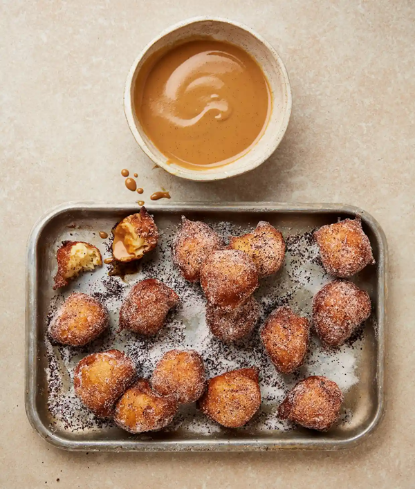 Ricotta fritters with hibiscus sugar and cajeta