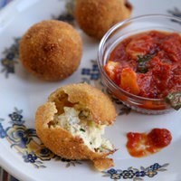 Ricotta fritters with tomato sauce