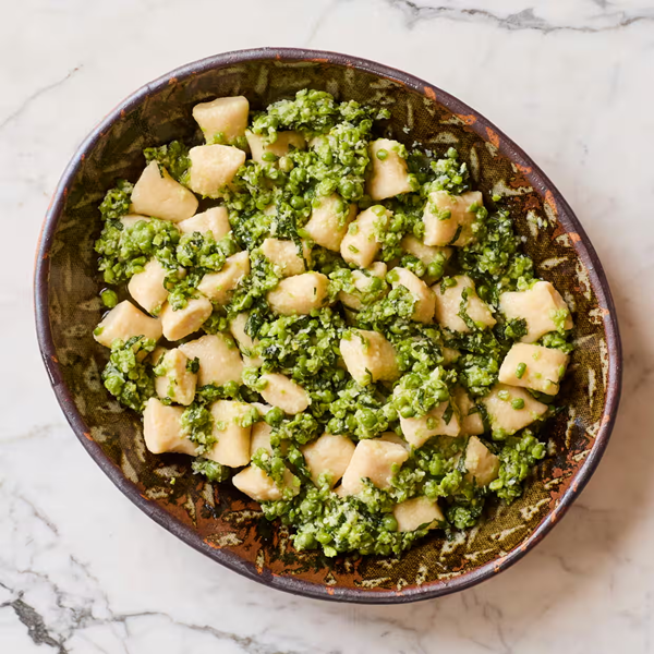 Ricotta gnocchi with raw pea pesto