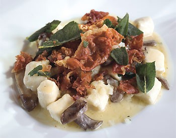 Ricotta gnudi with wild mushroom and truffle sauce
