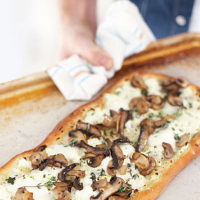 Ricotta, mushroom, mozzarella and thyme pizza
