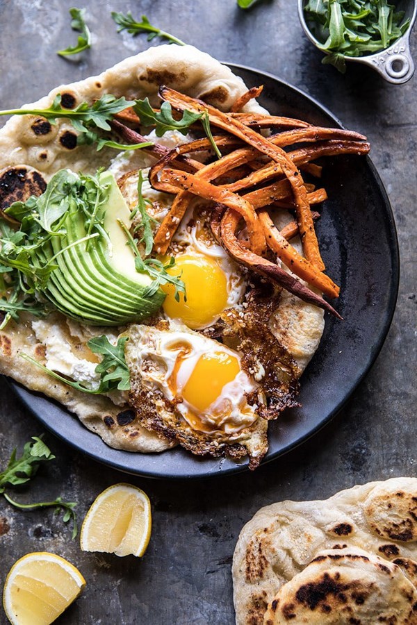 Ricotta naan with fried eggs and sweet potato fries