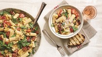 Rigatoni with charred corn, sweet onion, cherry tomatoes, and bacon