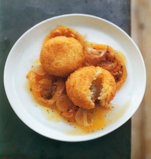 Risotto balls with baked green tomatoes