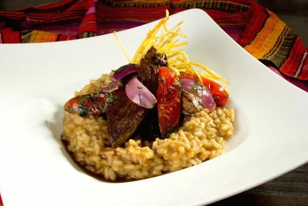 Risotto with lomo saltado