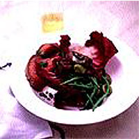Roast beef salad with radicchio, green olives and red onion rings