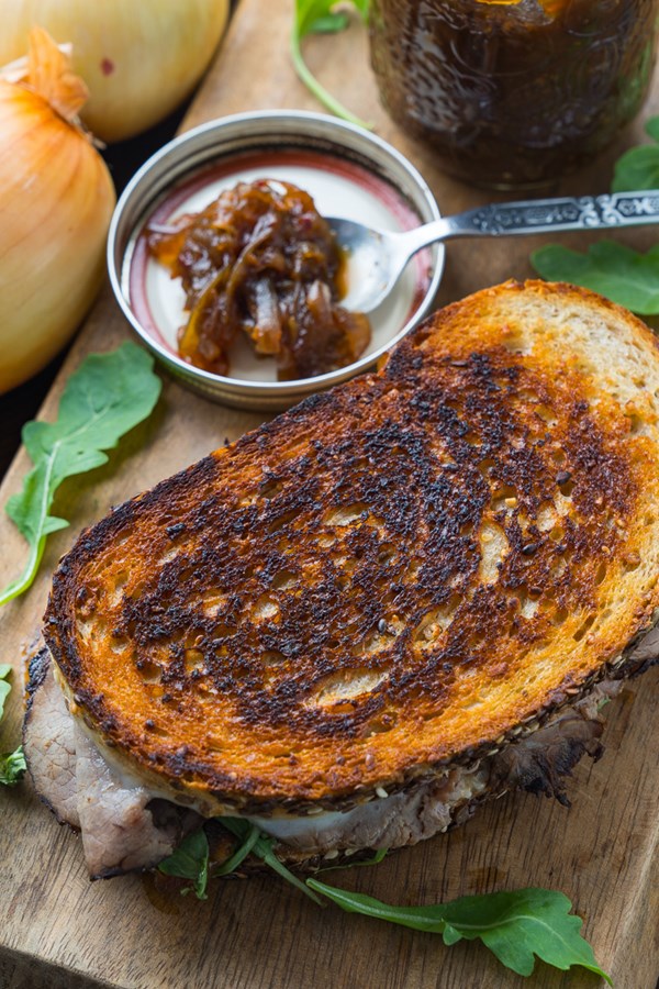 Roast beef sandwich with maple chipotle onion jam and horseradish mayo