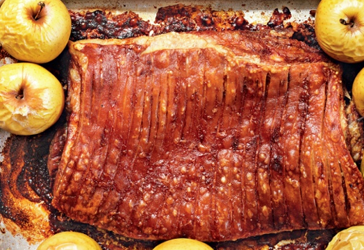 Roast belly of pork with baked apples