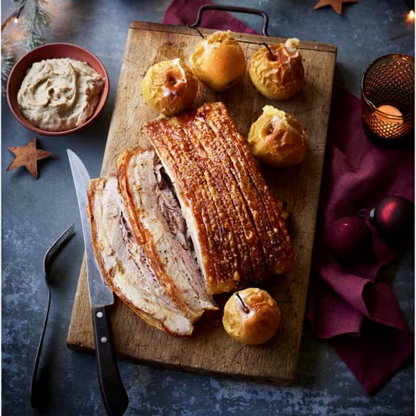 Roast belly of pork with baked apples