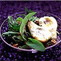 Roast blue cheese pear in a rocket and hazelnut salad