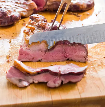 Roast butterflied leg of lamb with coriander, rosemary, and red pepper
