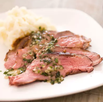 Roast butterflied leg of lamb with coriander, cumin, and mustard seeds