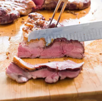Roast butterflied leg of lamb with coriander, rosemary, and red pepper