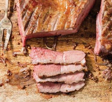 Roast butterflied leg of lamb with coriander, cumin, and mustard seeds