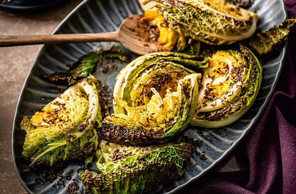 Roast cabbage wedges with caraway seeds
