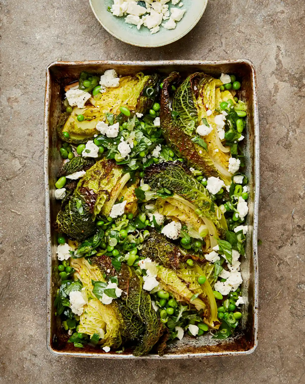 Roast cabbage with lemony peas and feta