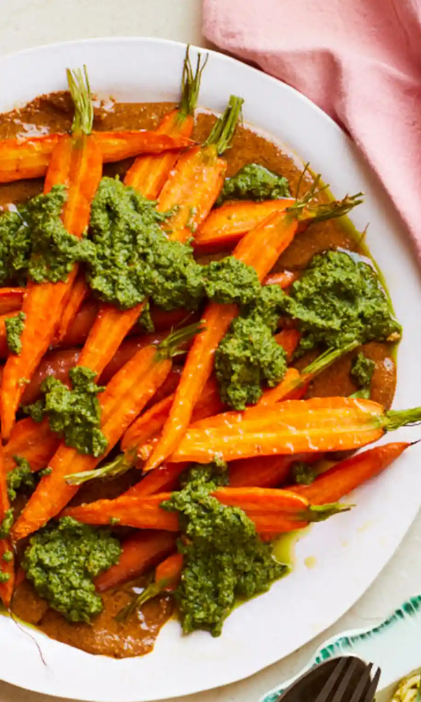 Roast carrots with carrot top pesto and almonds