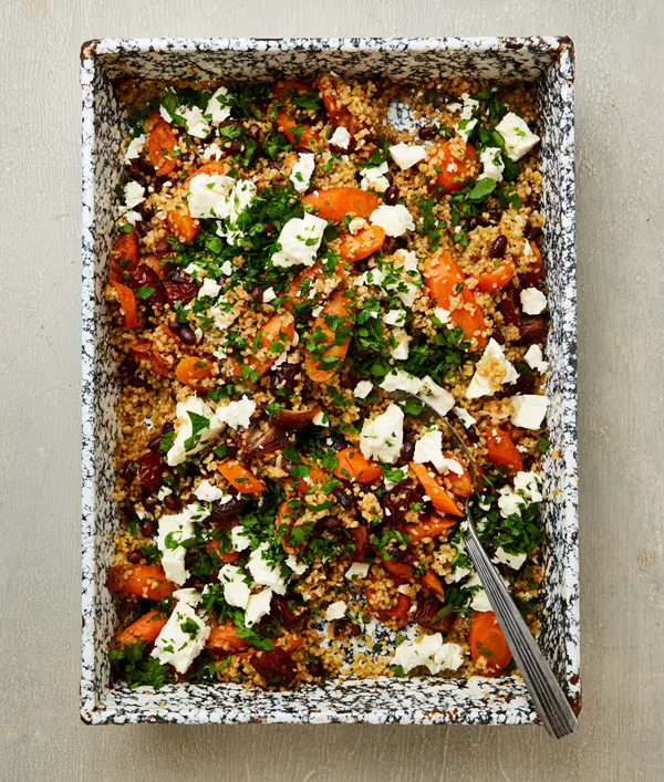 Roast carrots with feta, dates, bulgur and beans