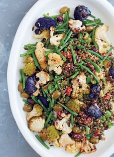Roast cauliflower, seeds, olives, green and broad beans and peas