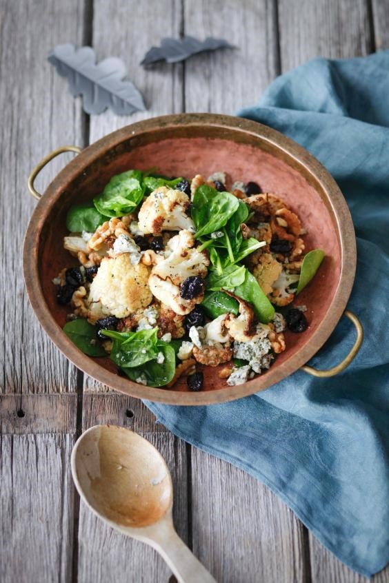 Roast cauliflower, spinach & blue cheese salad with cherries & walnuts