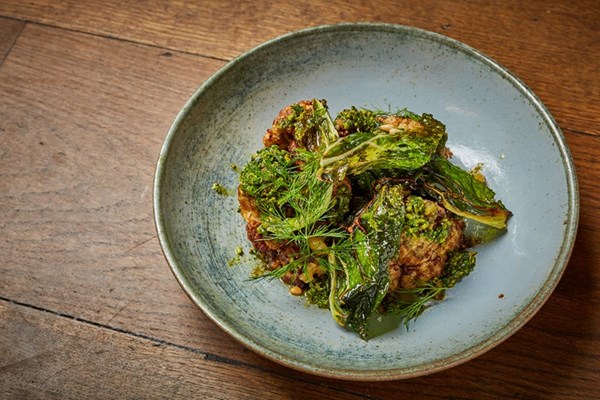 Roast cauliflower with pine nuts, raisins and pistachio pesto