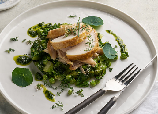 Roast chicken breast, confit leg, lettuce, peas, herbs