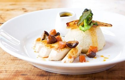 Roast chicken breast with sage and onion pudding