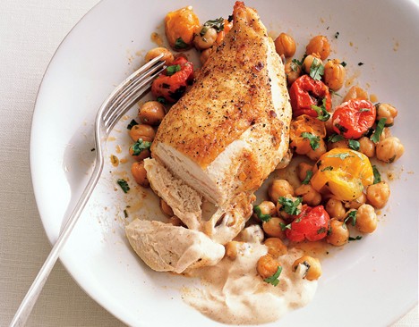 Roast chicken breasts with garbanzo beans, tomatoes, and paprika