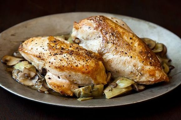 Roast chicken breasts with mushrooms and artichokes