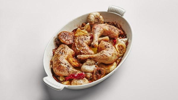 Roast chicken legs with lots of garlic