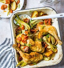Roast chicken legs with potatoes, fennel, tomatoes, thyme and garlic