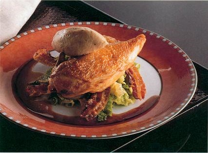 Roast chicken on cabbage with crispy pancetta and lemon and thyme dumplings