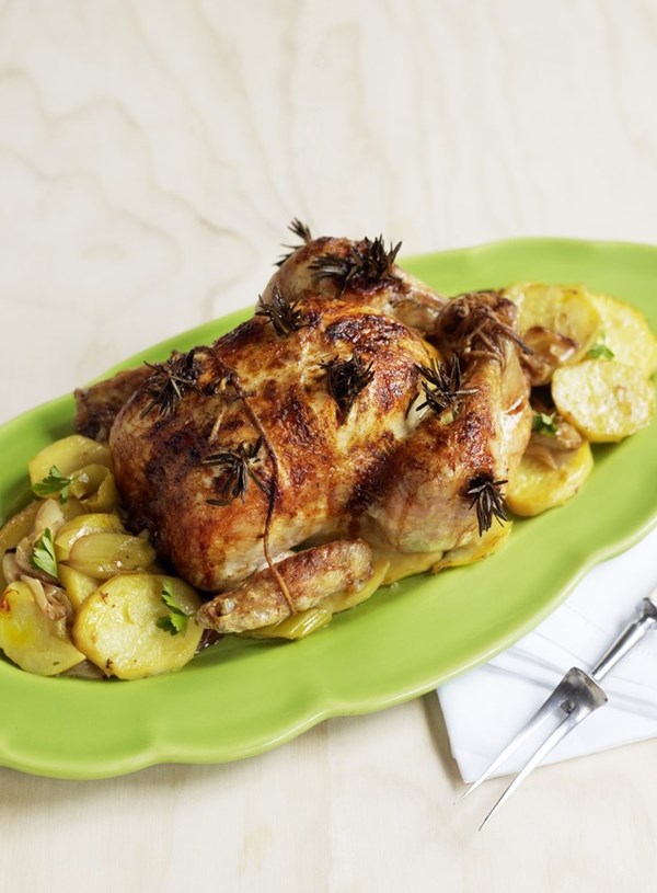 Roast chicken on saffron potatoes and leeks